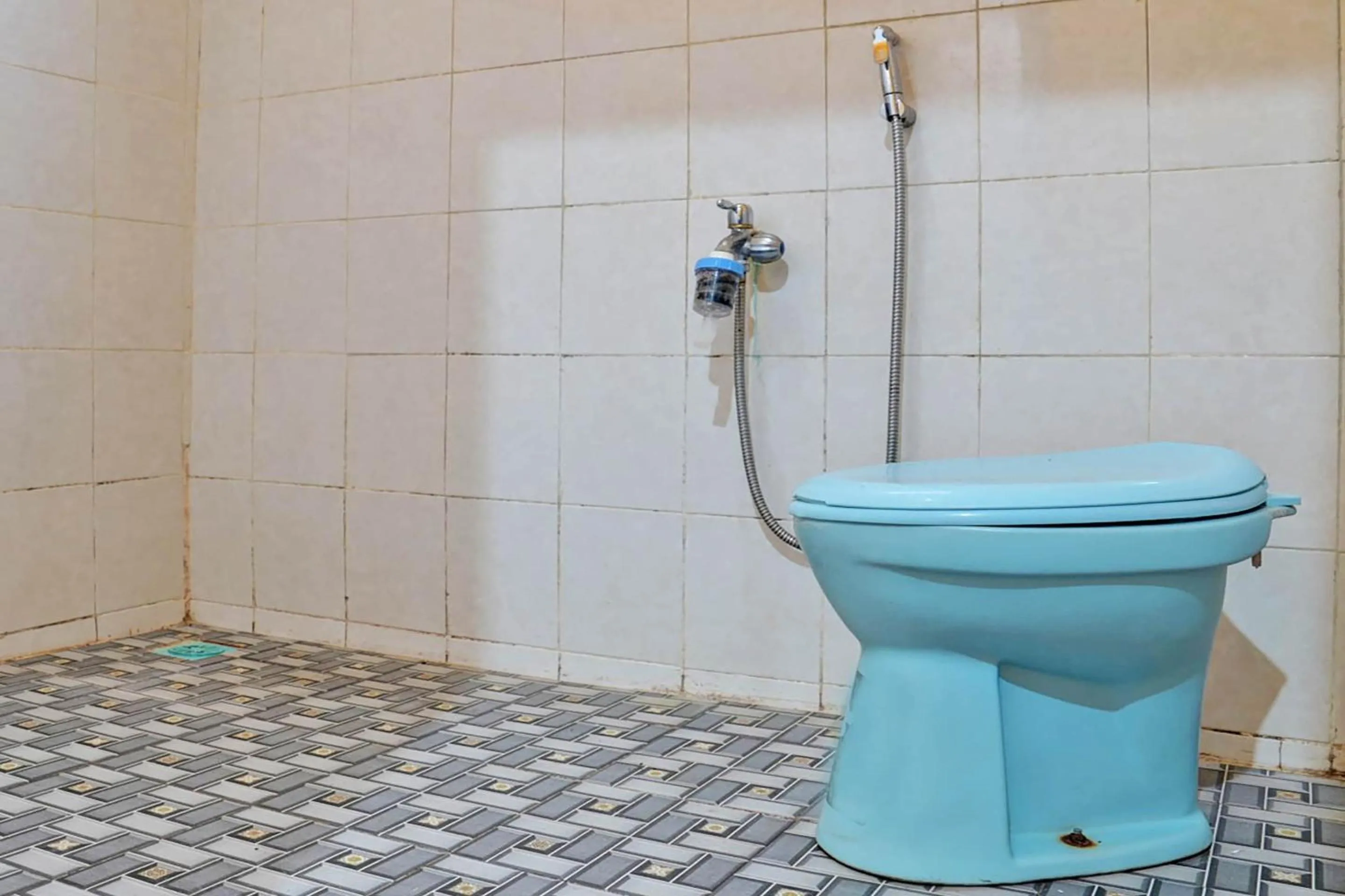 Bathroom in Hotel O Penginapan Hj Lilis Syariah