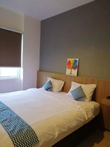 Bed in The Holiday Guest House