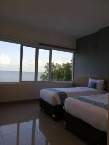 Bed in The Holiday Guest House