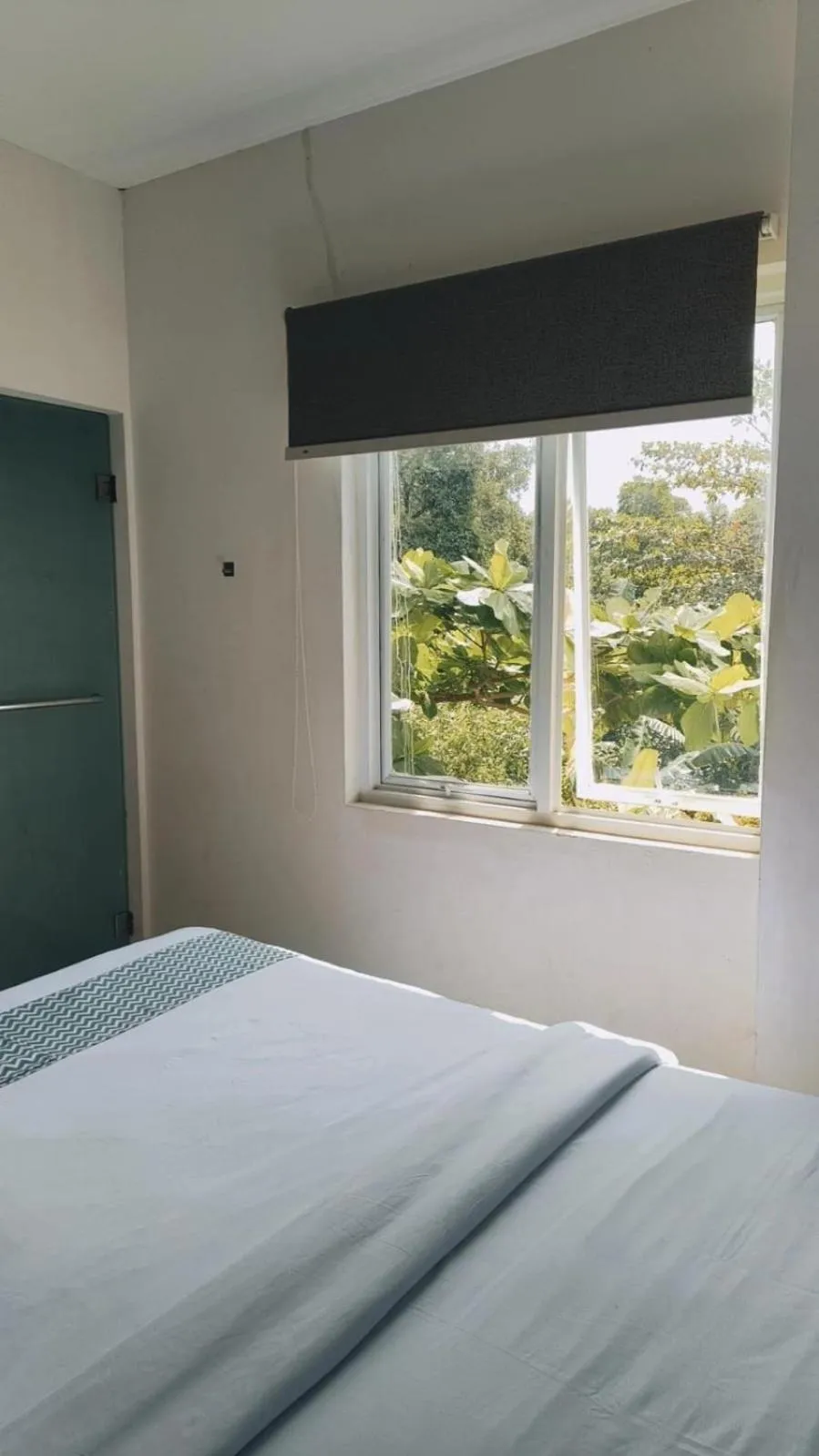 Photo of the whole room, Bed in The Holiday Guest House