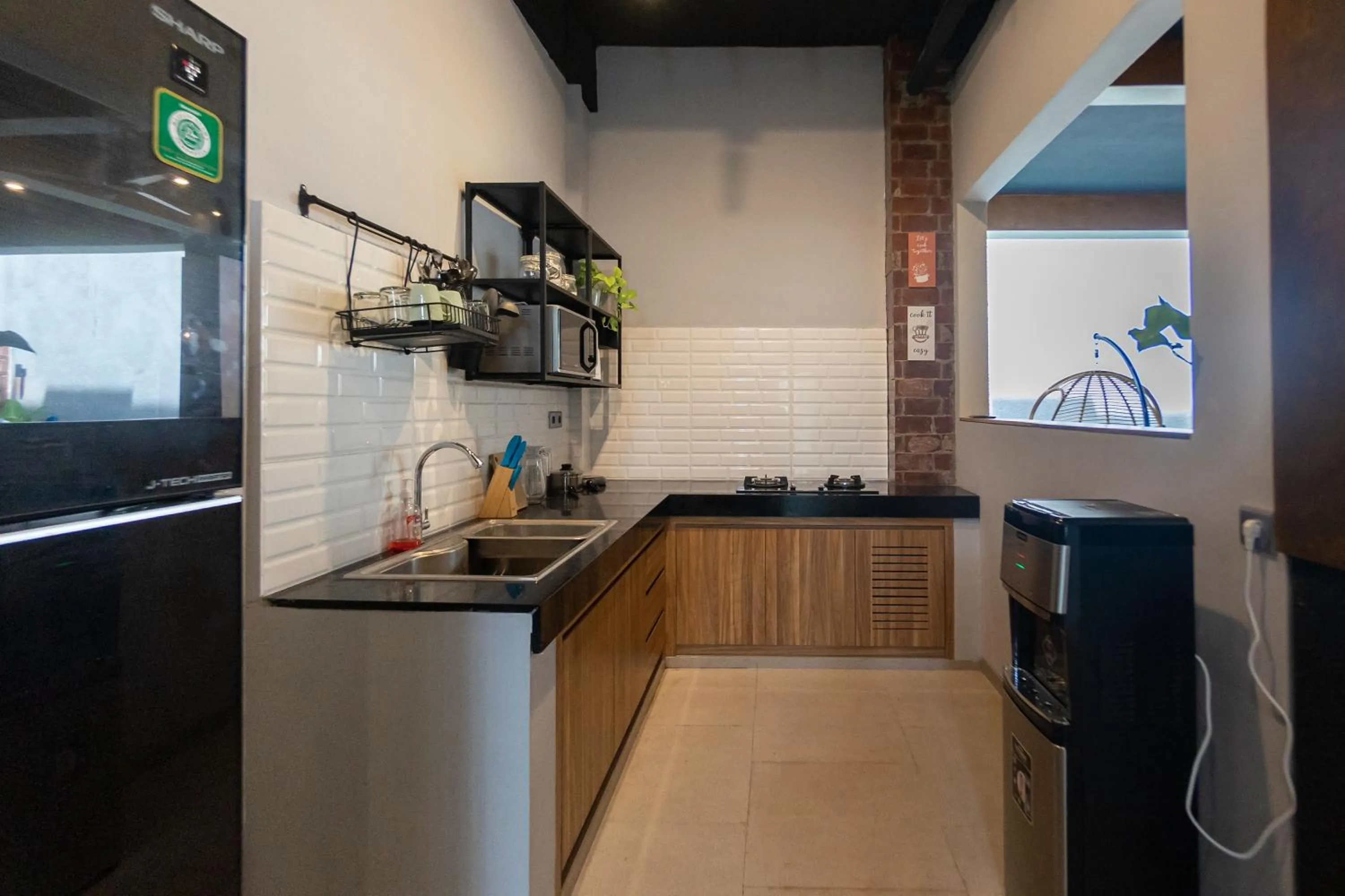 Kitchen or kitchenette in Sarang Comfort