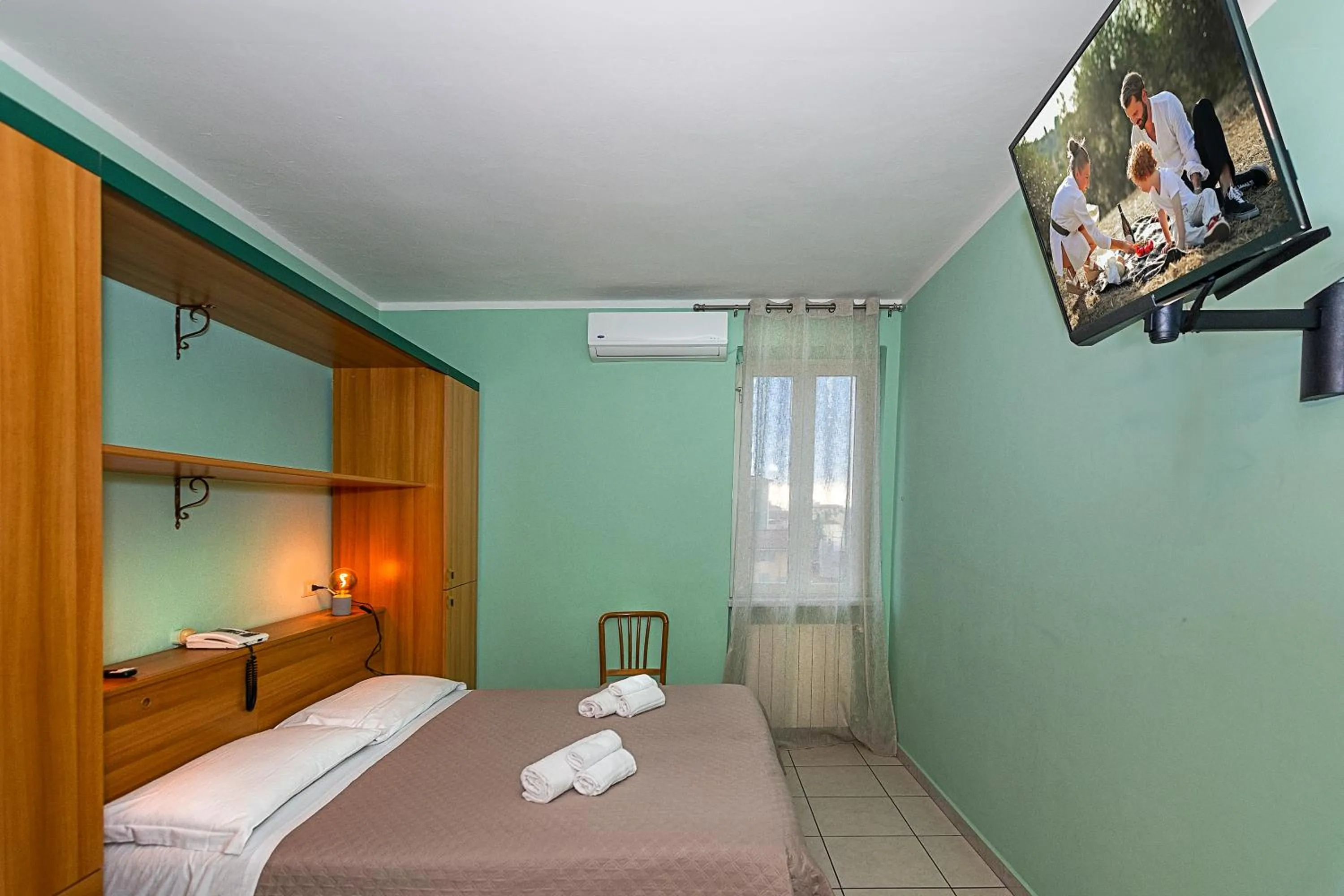 Bed in Hotel Villa Benvenuti