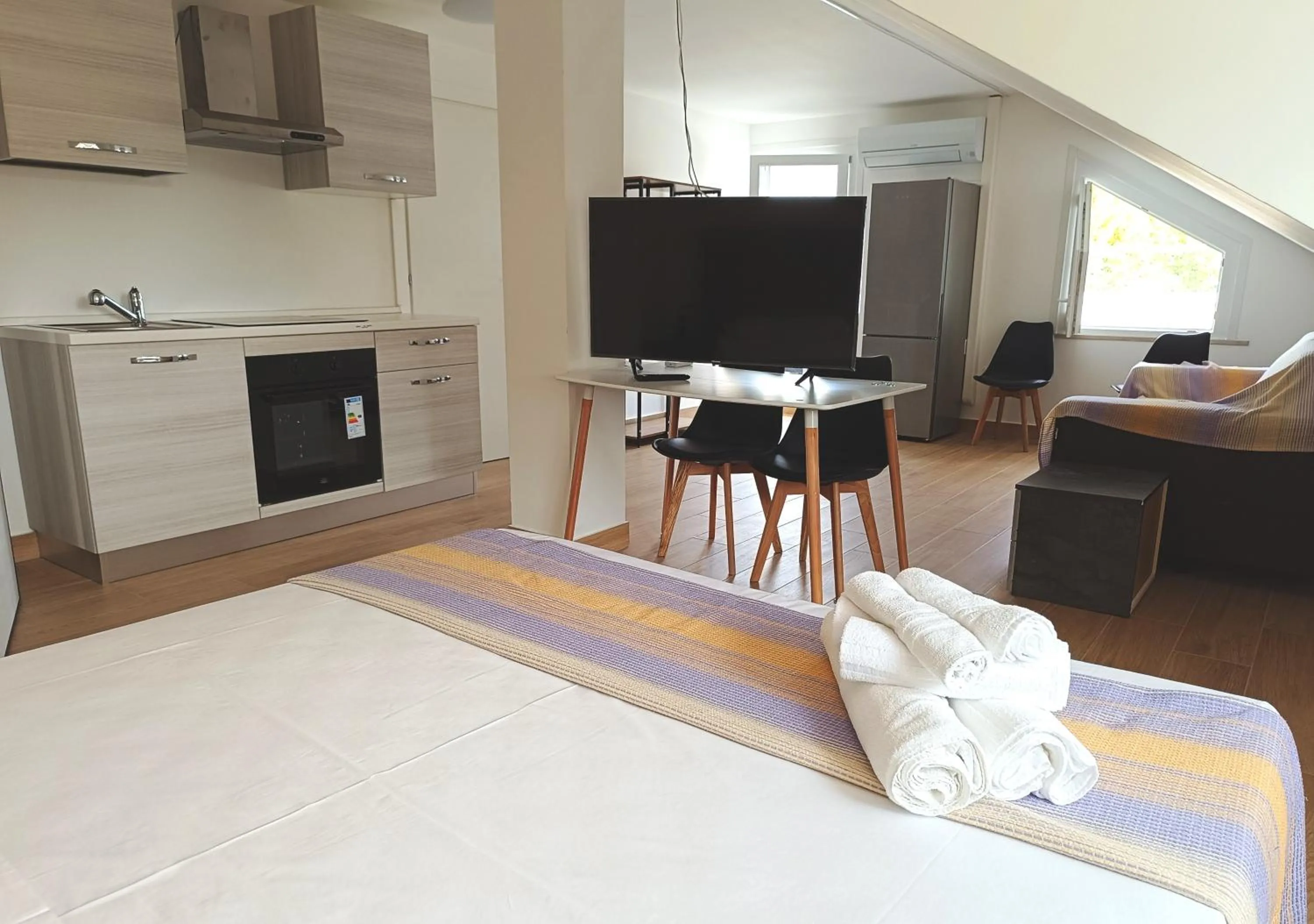 Living room, Bed in Residenza delle Nazioni