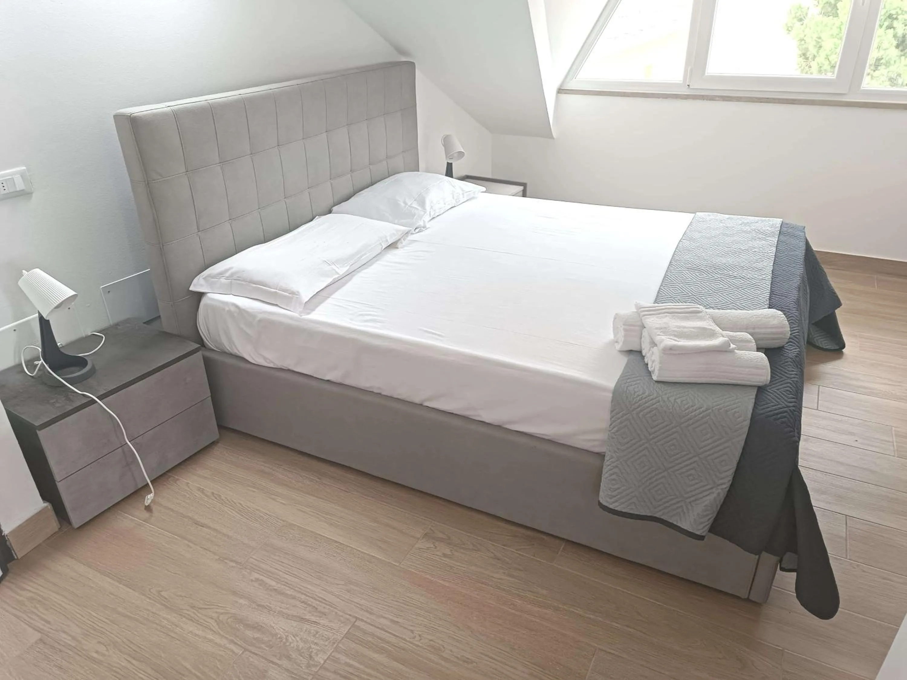 Photo of the whole room, Bed in Residenza delle Nazioni