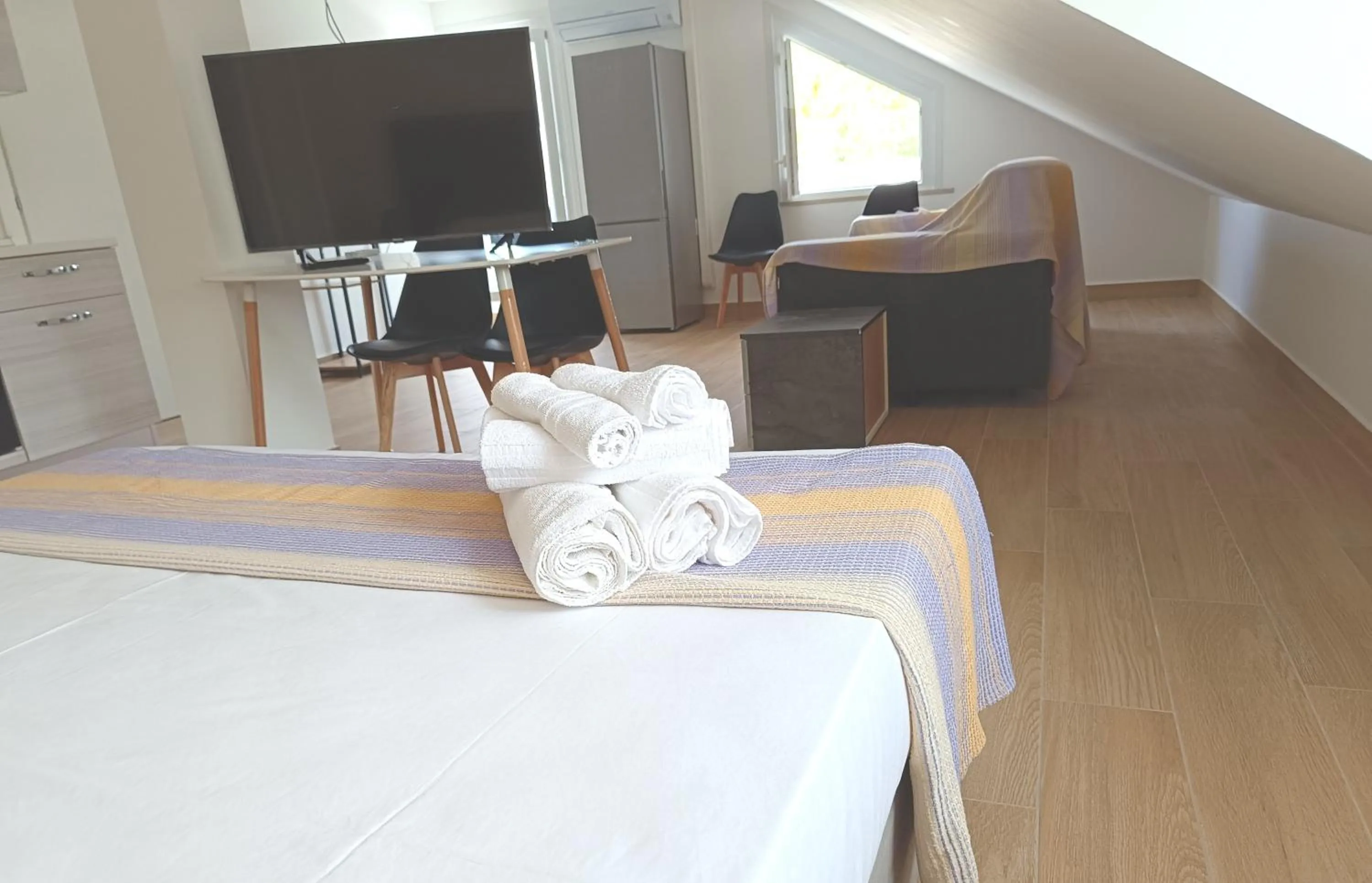 Communal lounge/ TV room, Bed in Residenza delle Nazioni