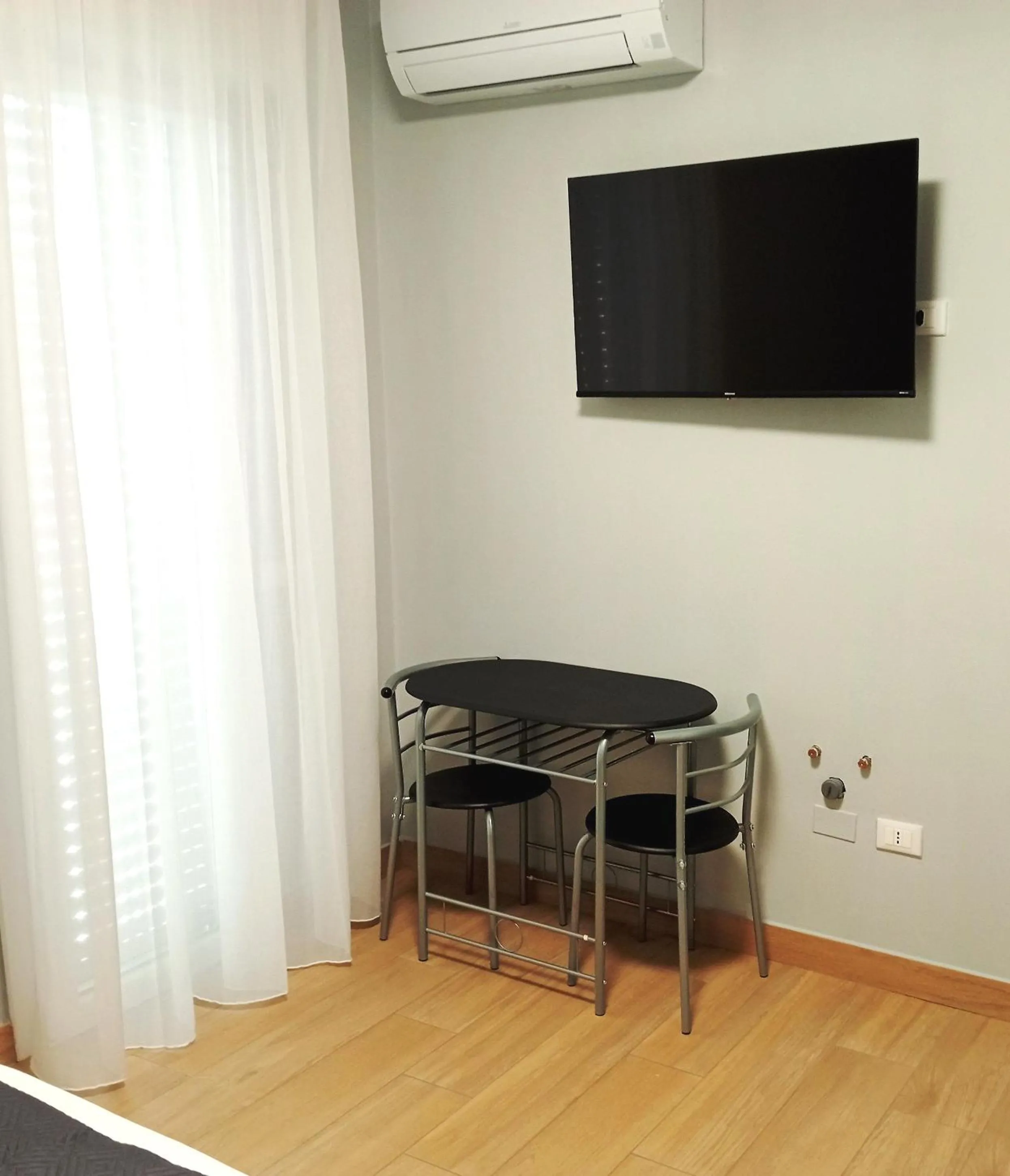 Communal lounge/ TV room in Residenza delle Nazioni