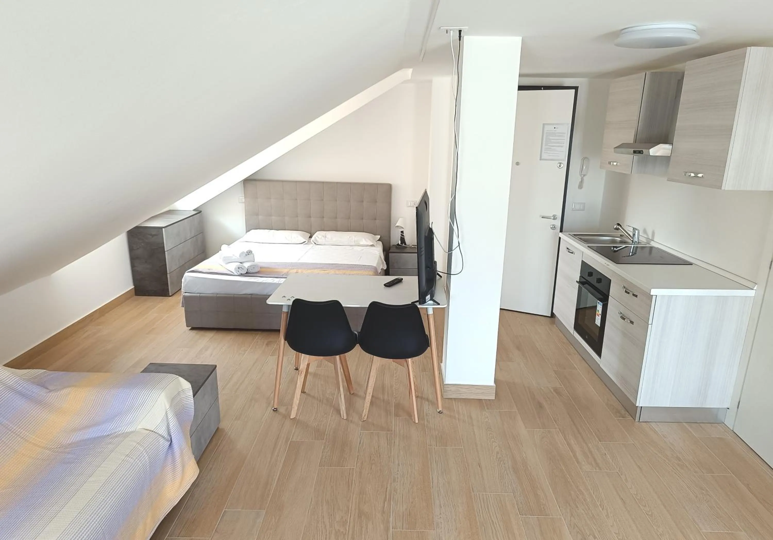 Living room, Bed in Residenza delle Nazioni