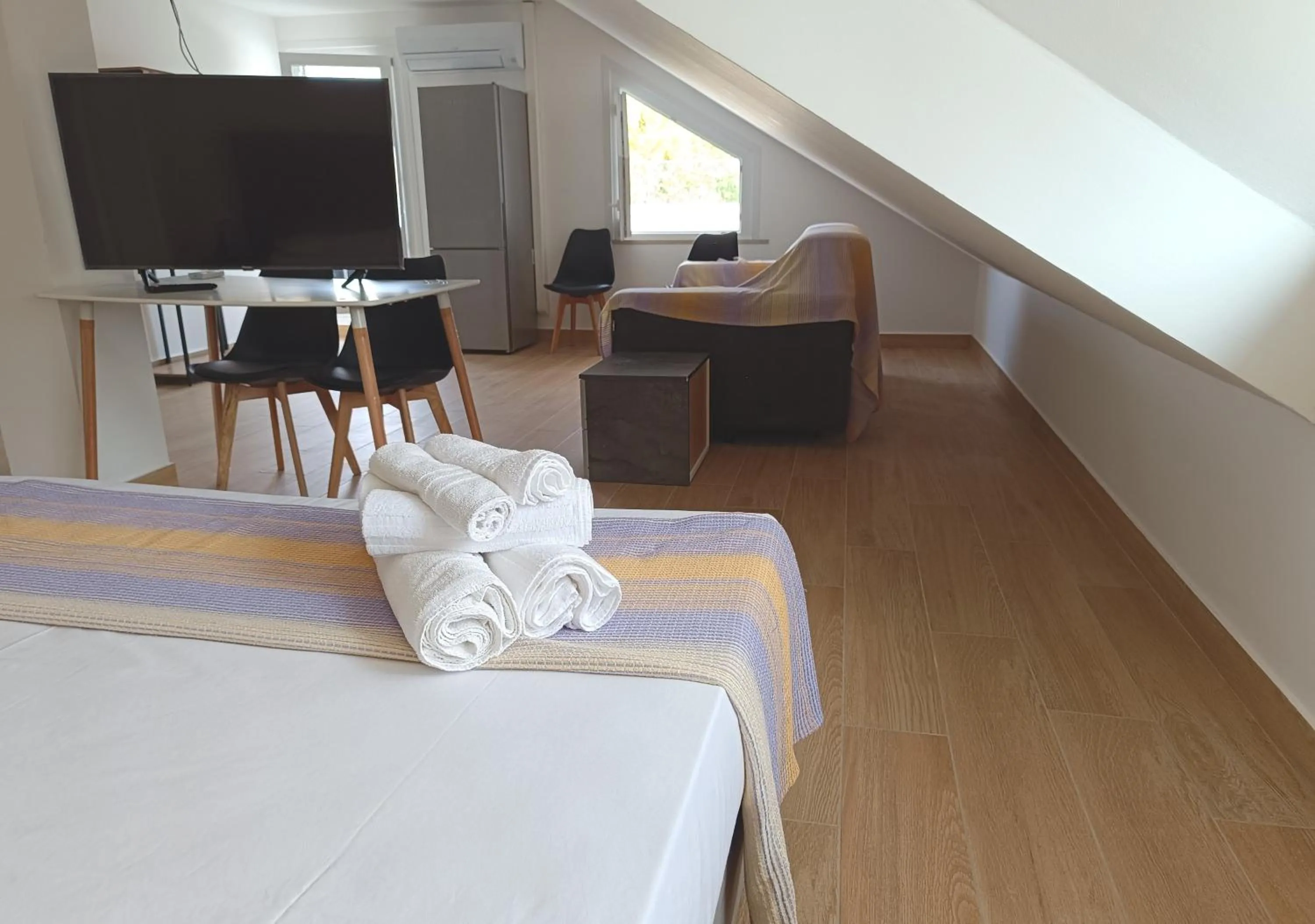 Communal lounge/ TV room, Bed in Residenza delle Nazioni