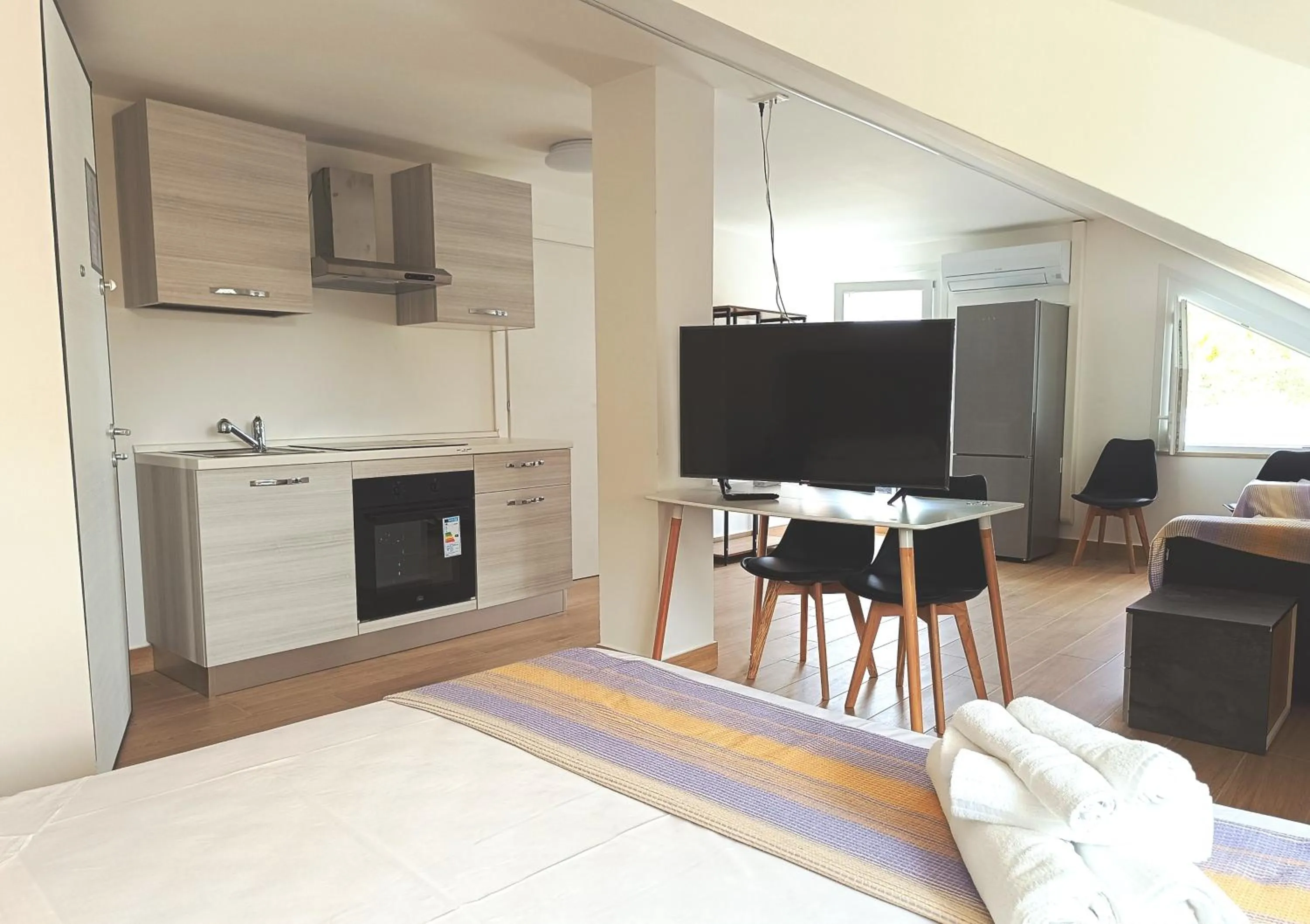 Communal lounge/ TV room in Residenza delle Nazioni