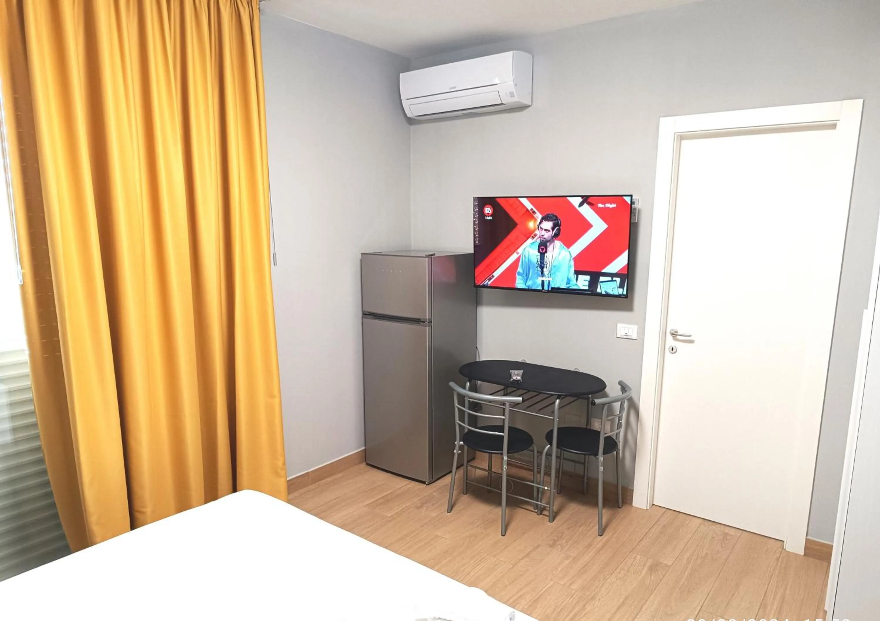 Communal lounge/ TV room, Bed in Residenza delle Nazioni