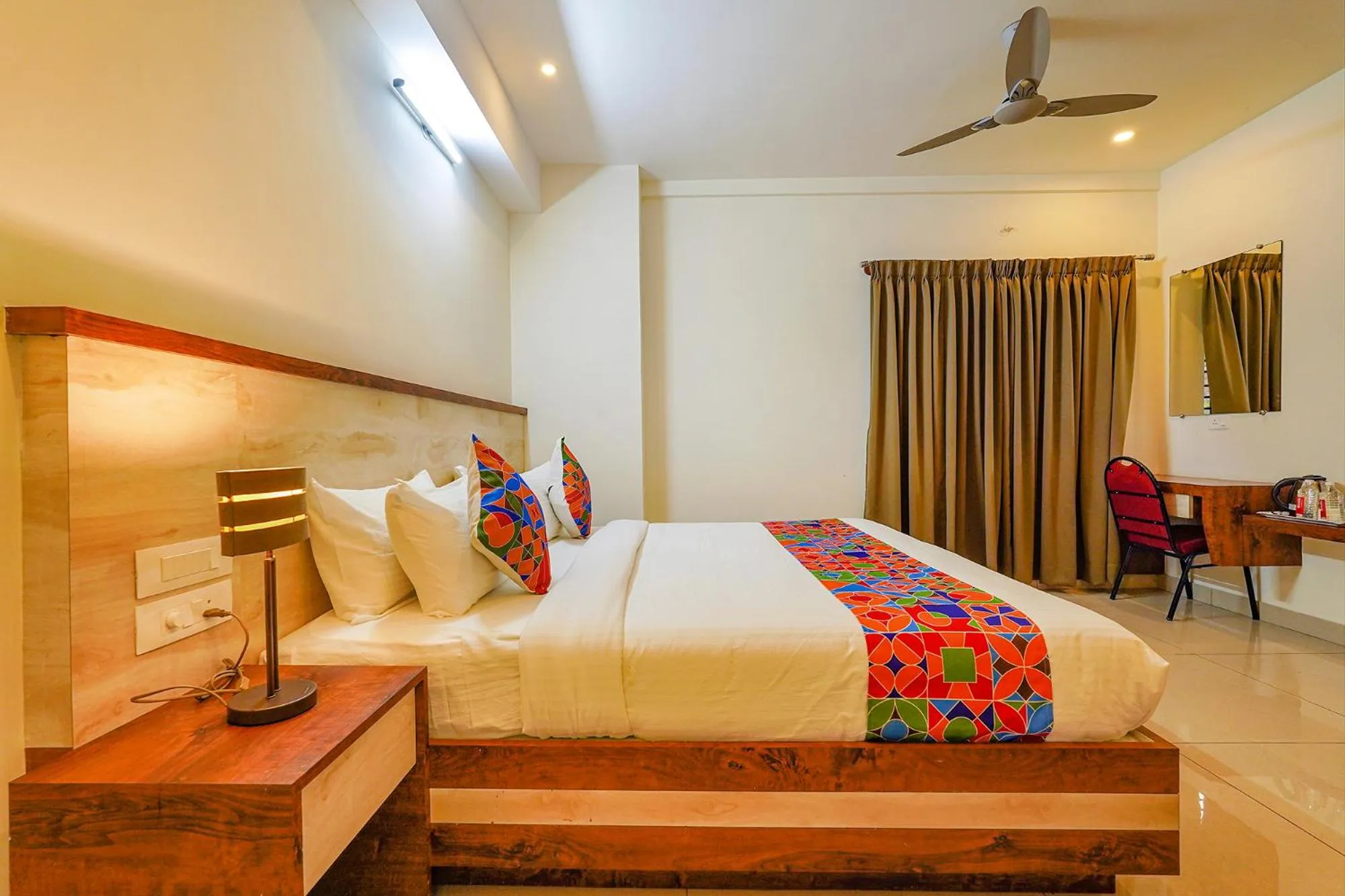 Photo of the whole room, Bed in FabHotel Shakthi Suites - Nr Jayadeva Hospital