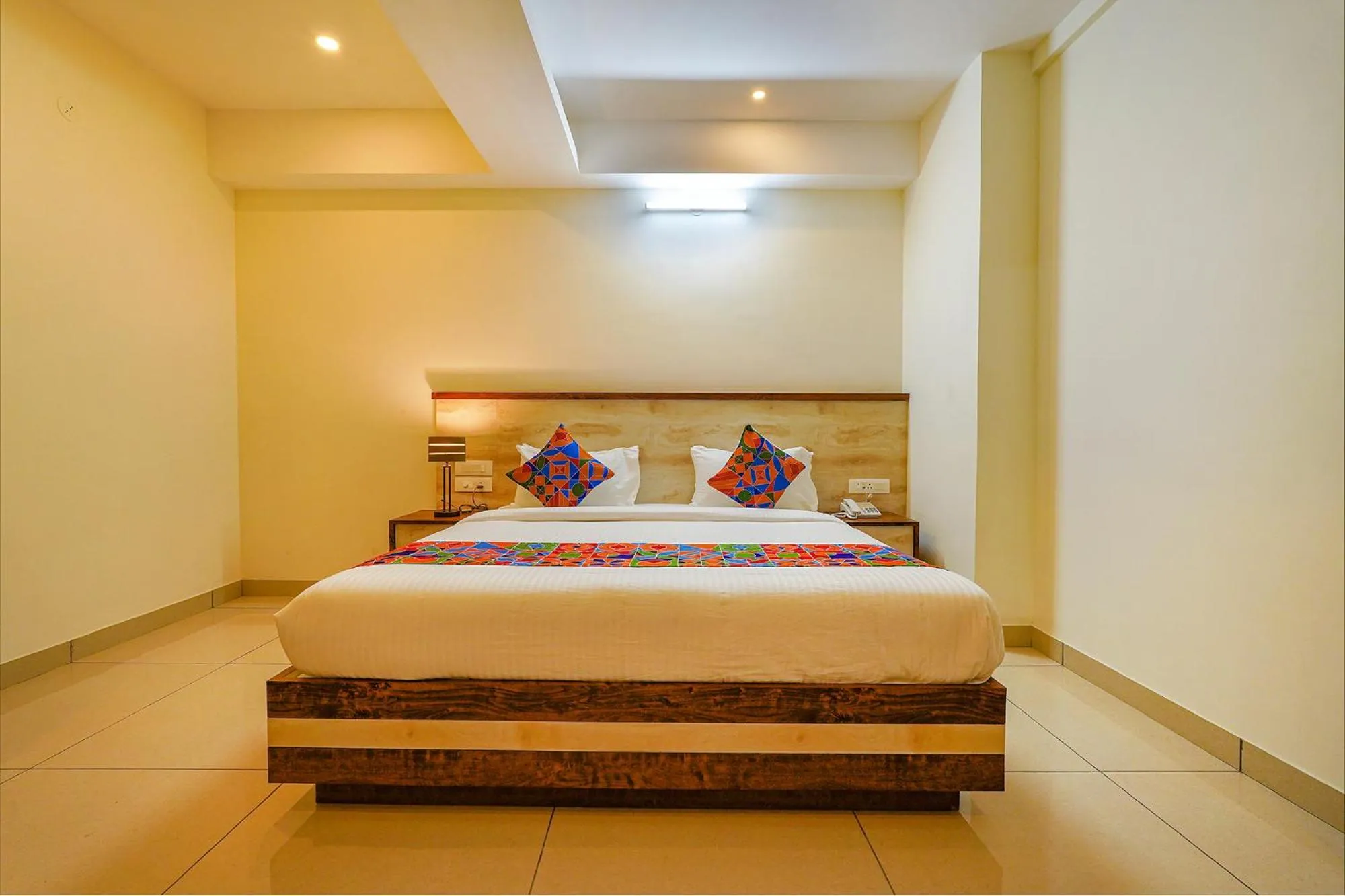 Bed in FabHotel Shakthi Suites - Nr Jayadeva Hospital