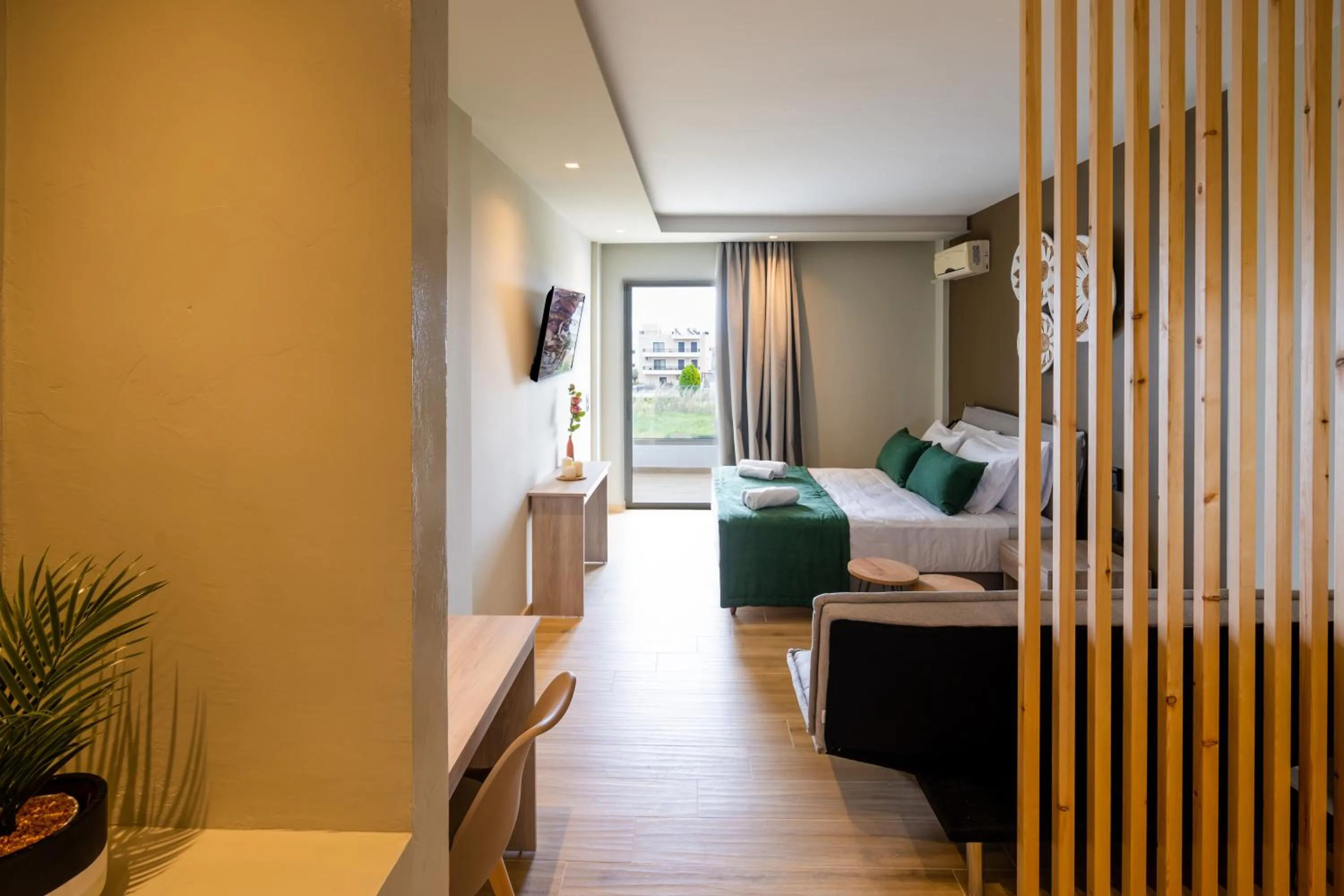 Bed in Nicolas Grand Suites, Adults Only