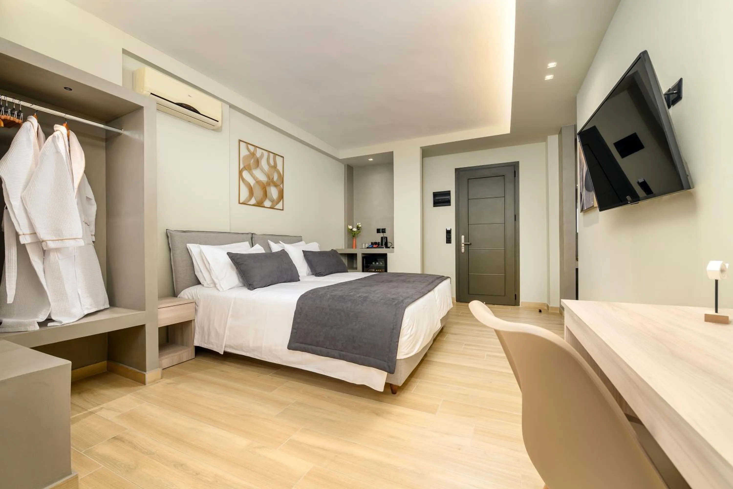 TV and multimedia, Bed in Nicolas Grand Suites, Adults Only