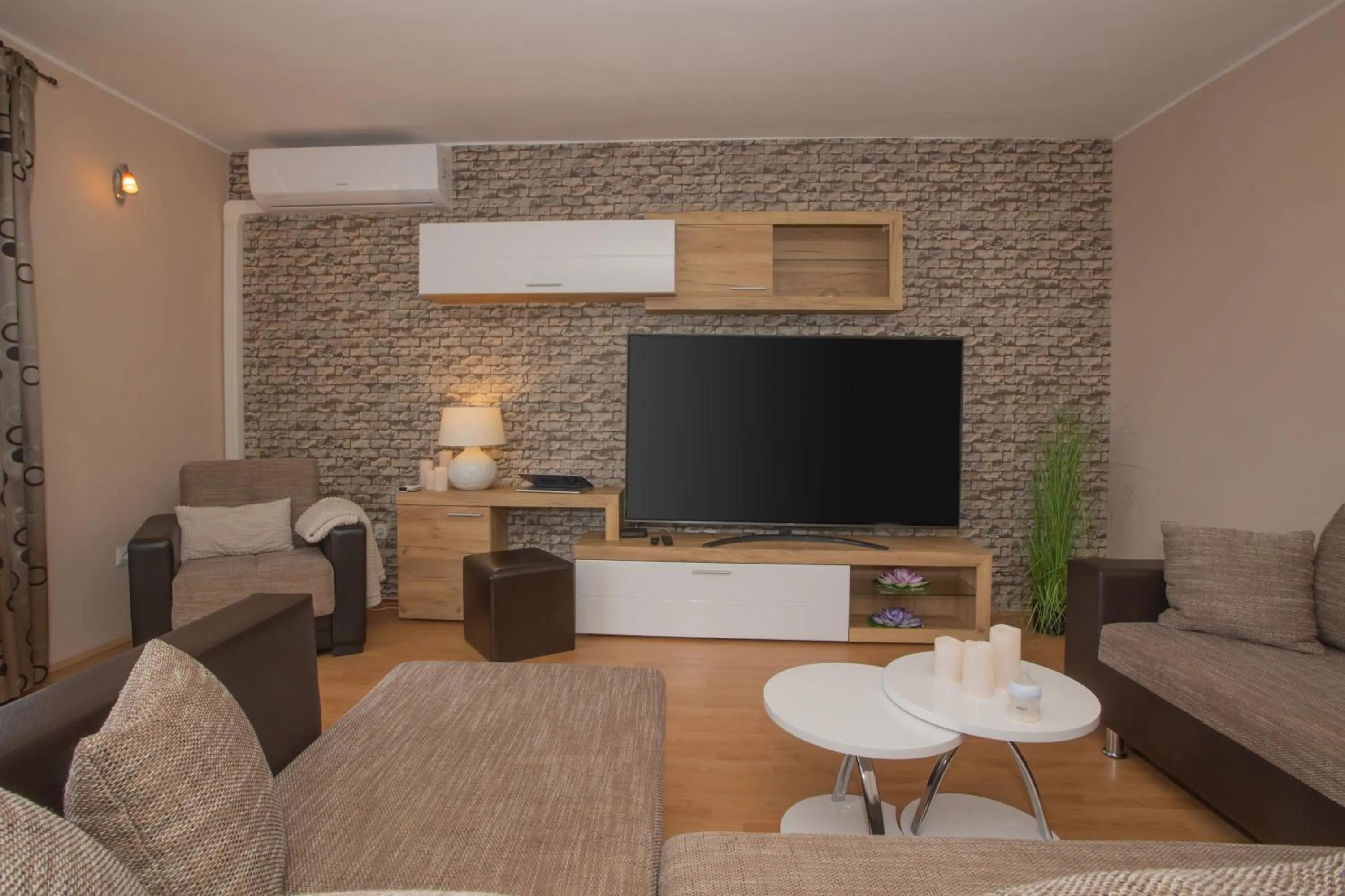 Communal lounge/ TV room in Apartment Mozart