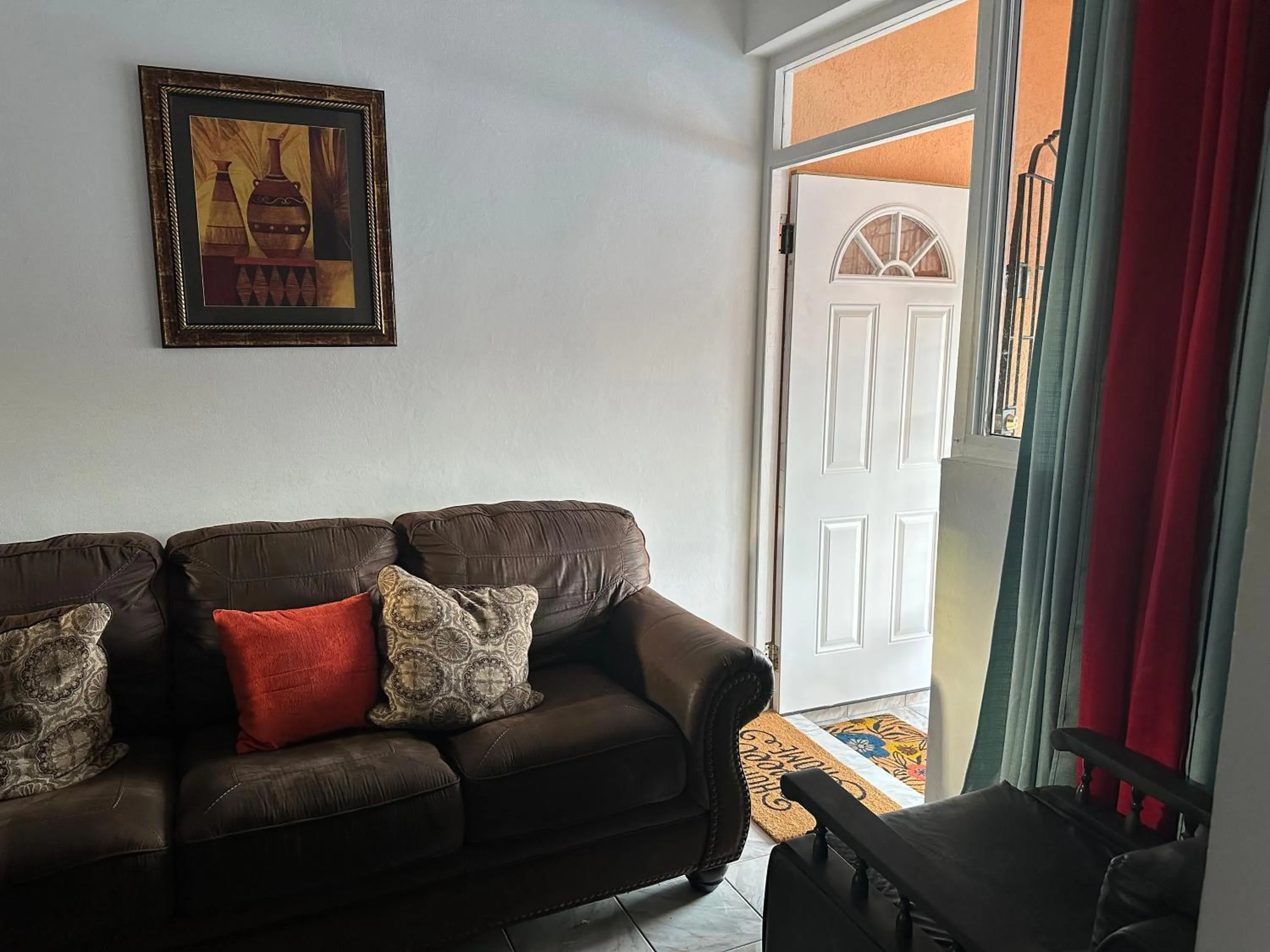 Living room in Sleeps2 - Private Pool - King Bed - AirCon