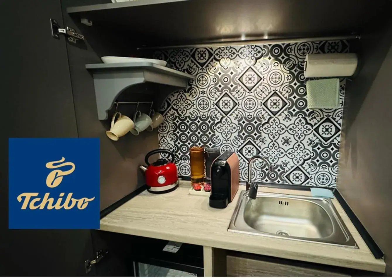 Kitchen or kitchenette in The House Company Kitchen or kitchenette in The House Company