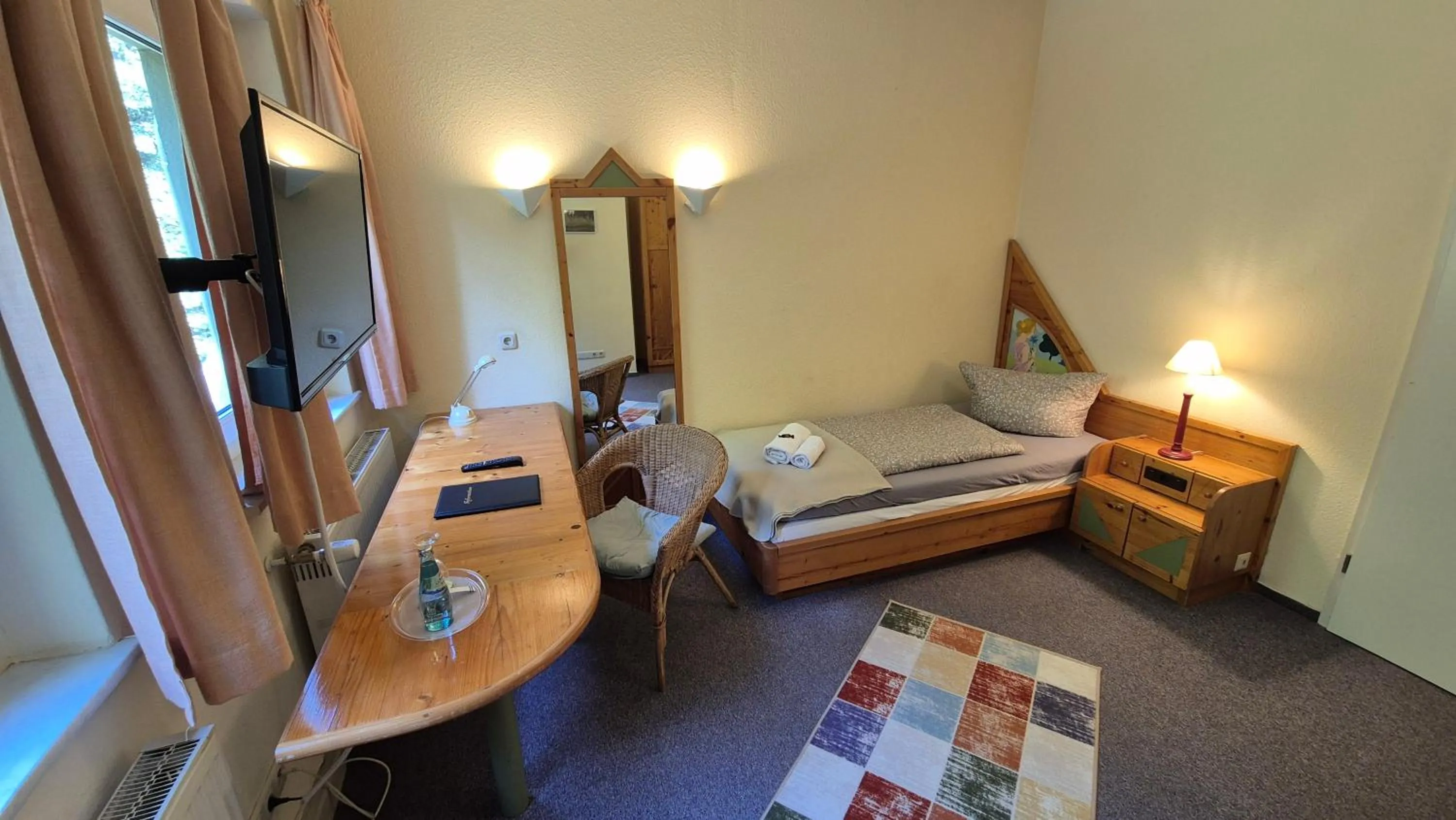 Photo of the whole room, Bed in Naturhotel Forsthaus