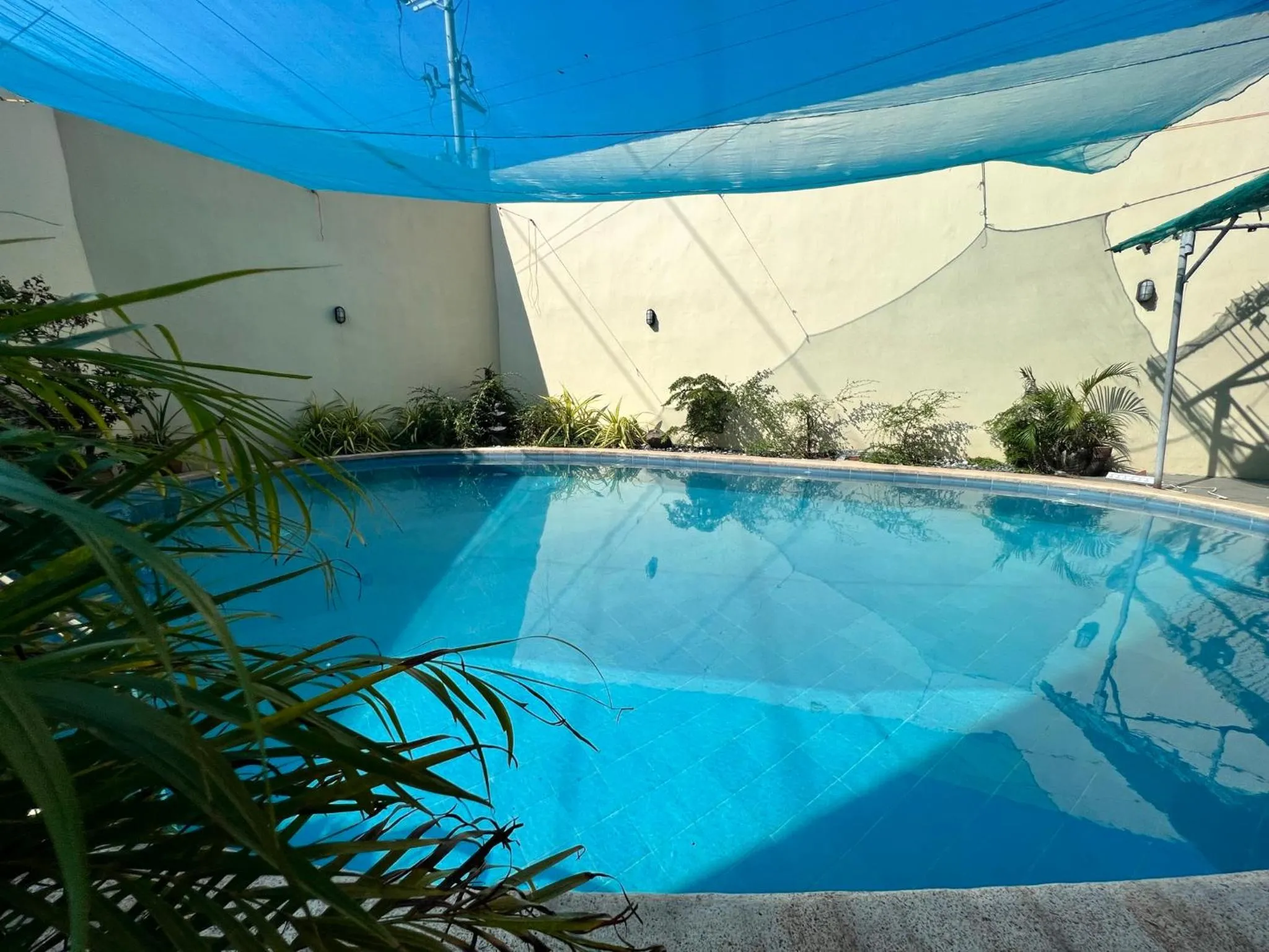 Pool view in Staycation Condotel Room To Stay