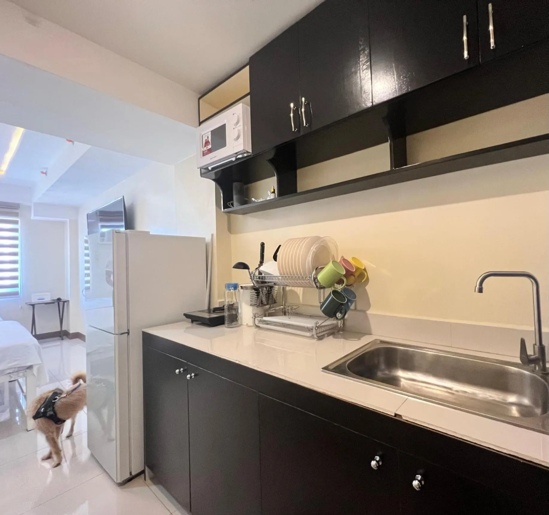 Kitchen or kitchenette in Staycation Condotel Room To Stay