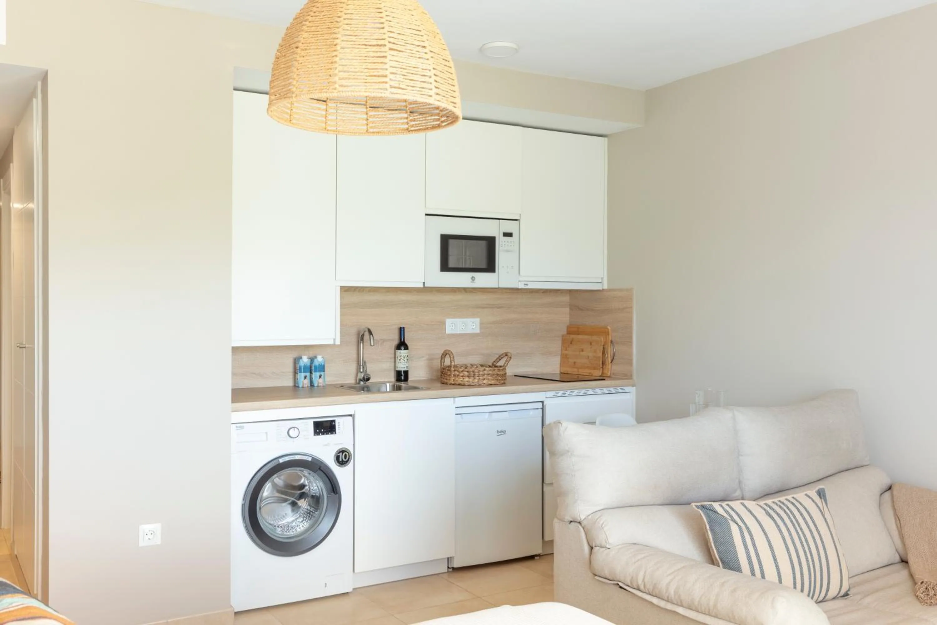 Kitchen or kitchenette in Apartamentos Martalia Áticos Deluxe