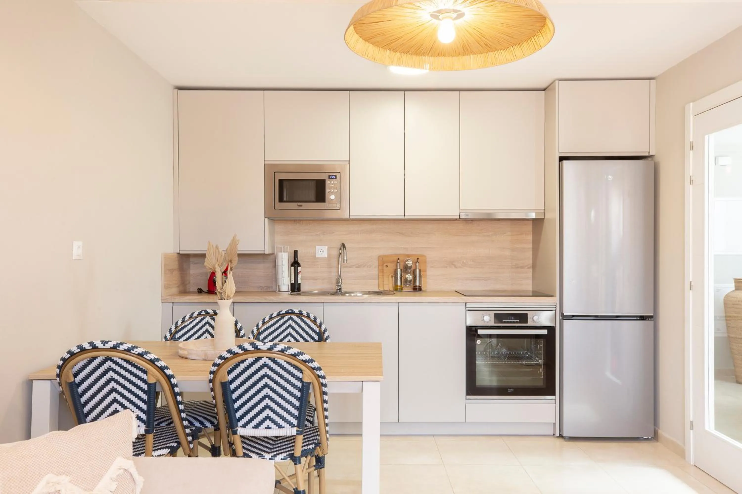 Kitchen or kitchenette in Apartamentos Martalia Áticos Deluxe