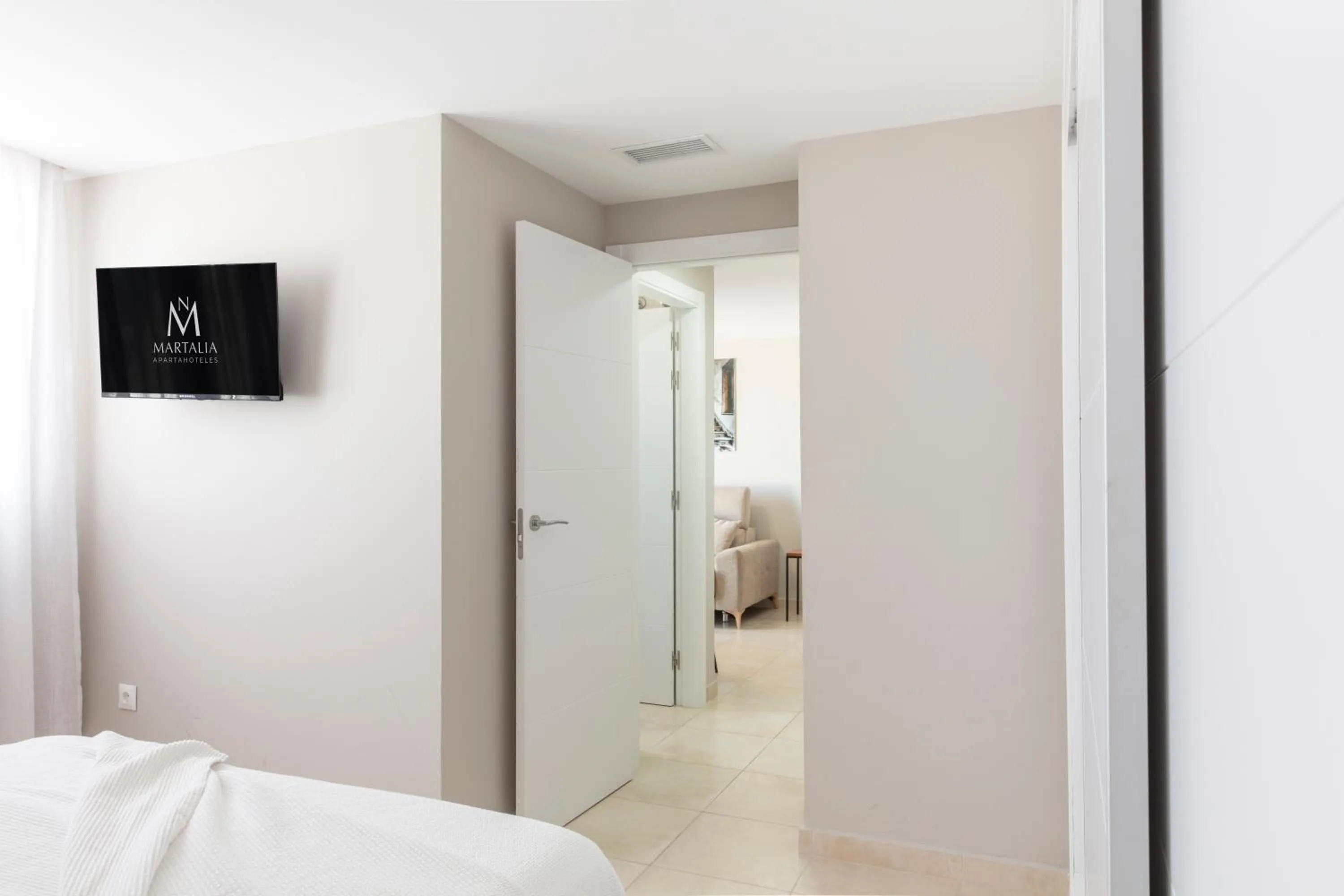 Photo of the whole room, Bed in Apartamentos Martalia Áticos Deluxe