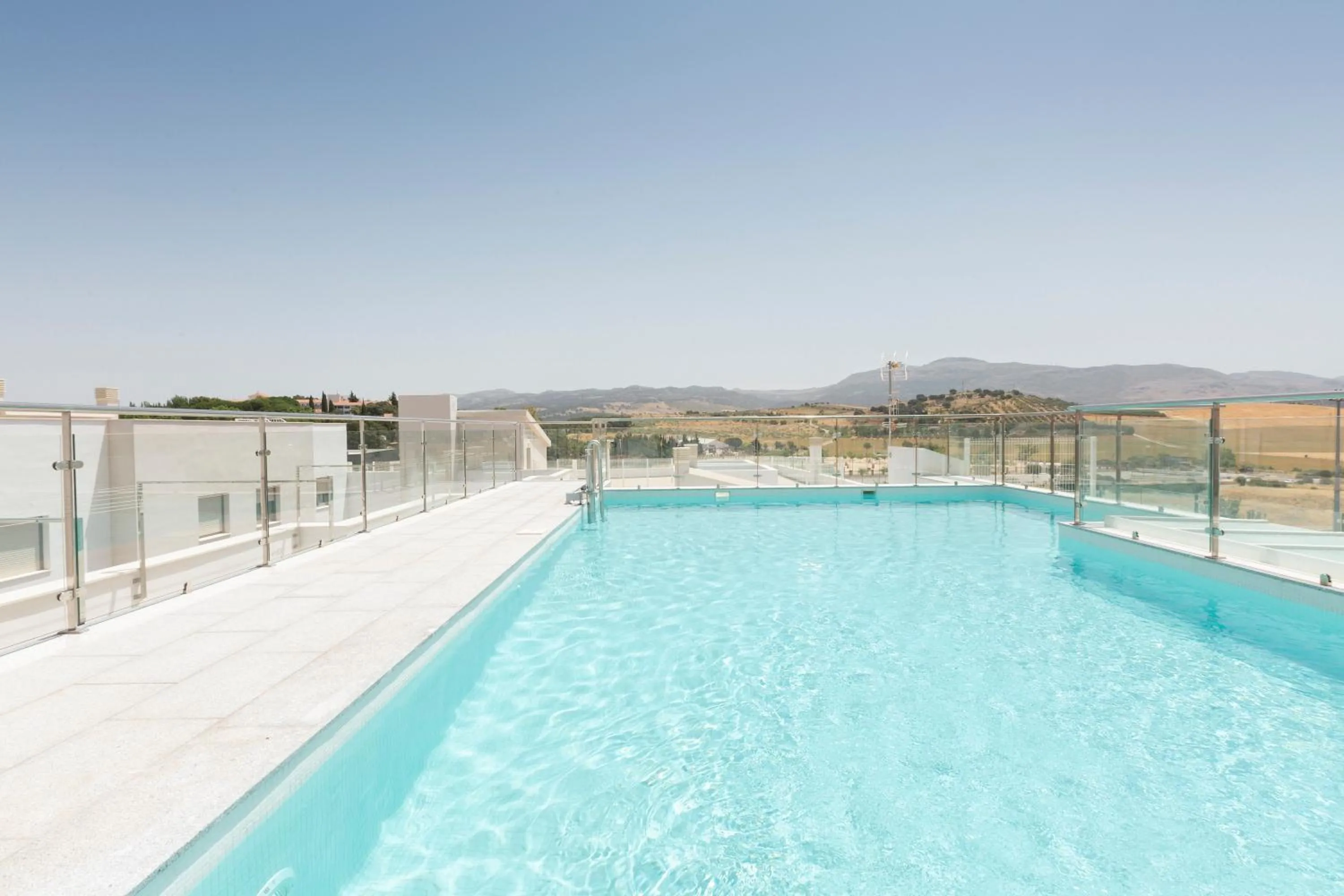 Swimming pool in Apartamentos Martalia Áticos Deluxe