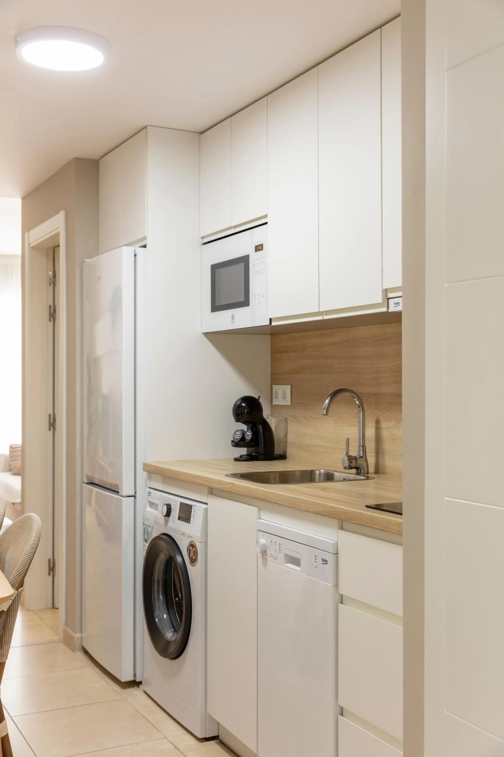 Kitchen or kitchenette in Apartamentos Martalia Áticos Deluxe