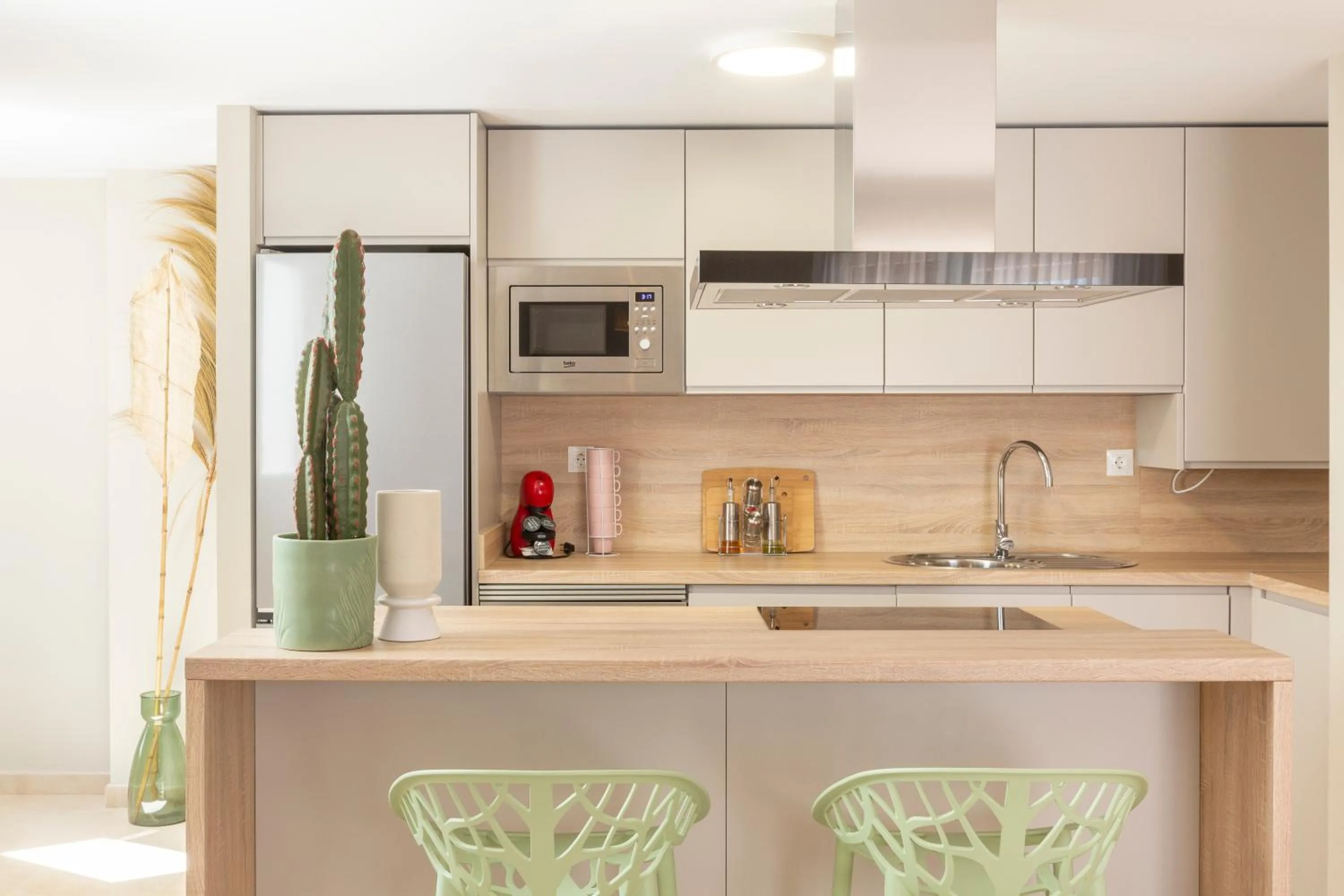 Kitchen or kitchenette in Apartamentos Martalia Áticos Deluxe
