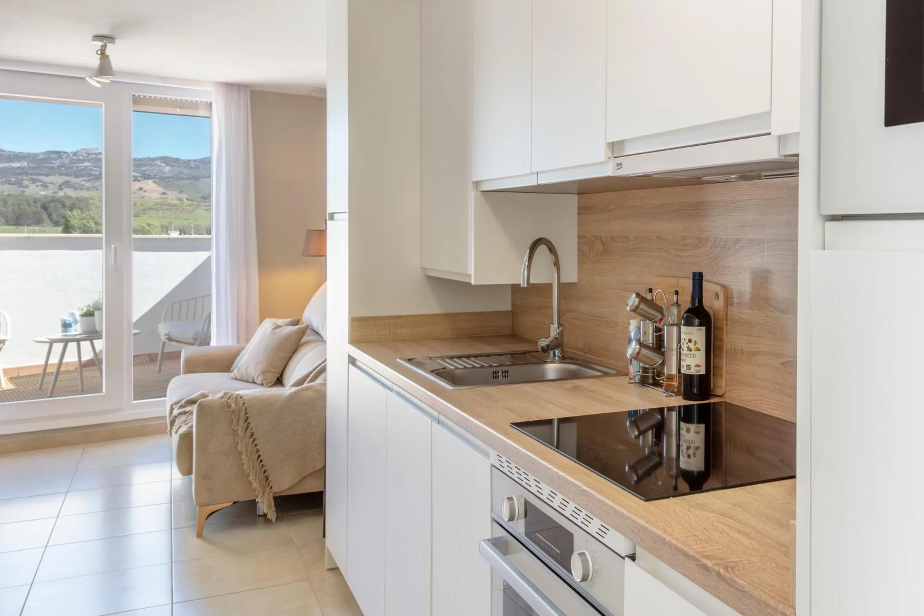Kitchen or kitchenette in Apartamentos Martalia Áticos Deluxe