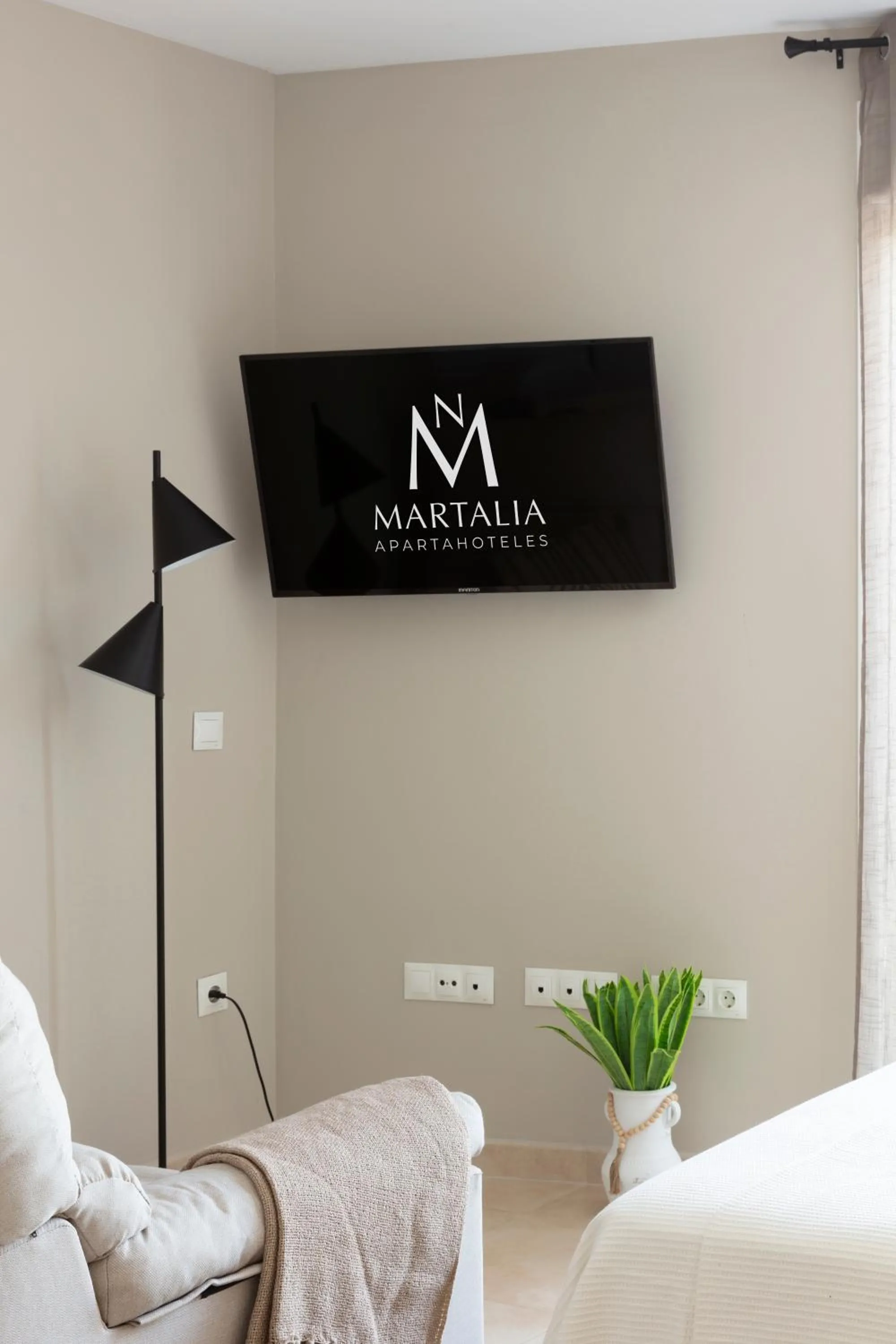 Photo of the whole room, Bed in Apartamentos Martalia Áticos Deluxe