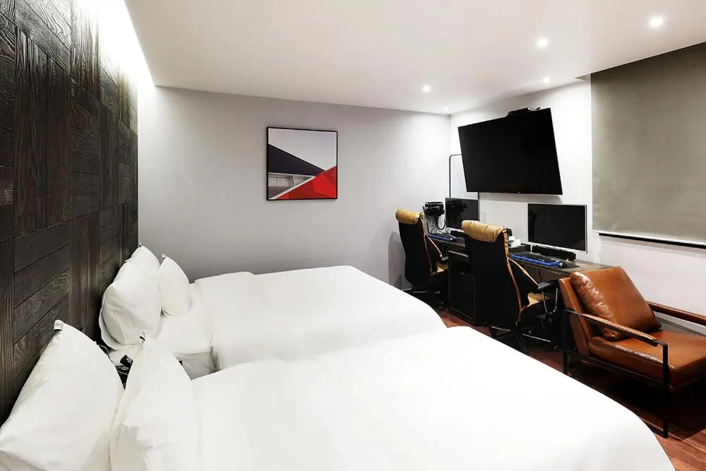 Bed in Mariposa Hotel Songtan