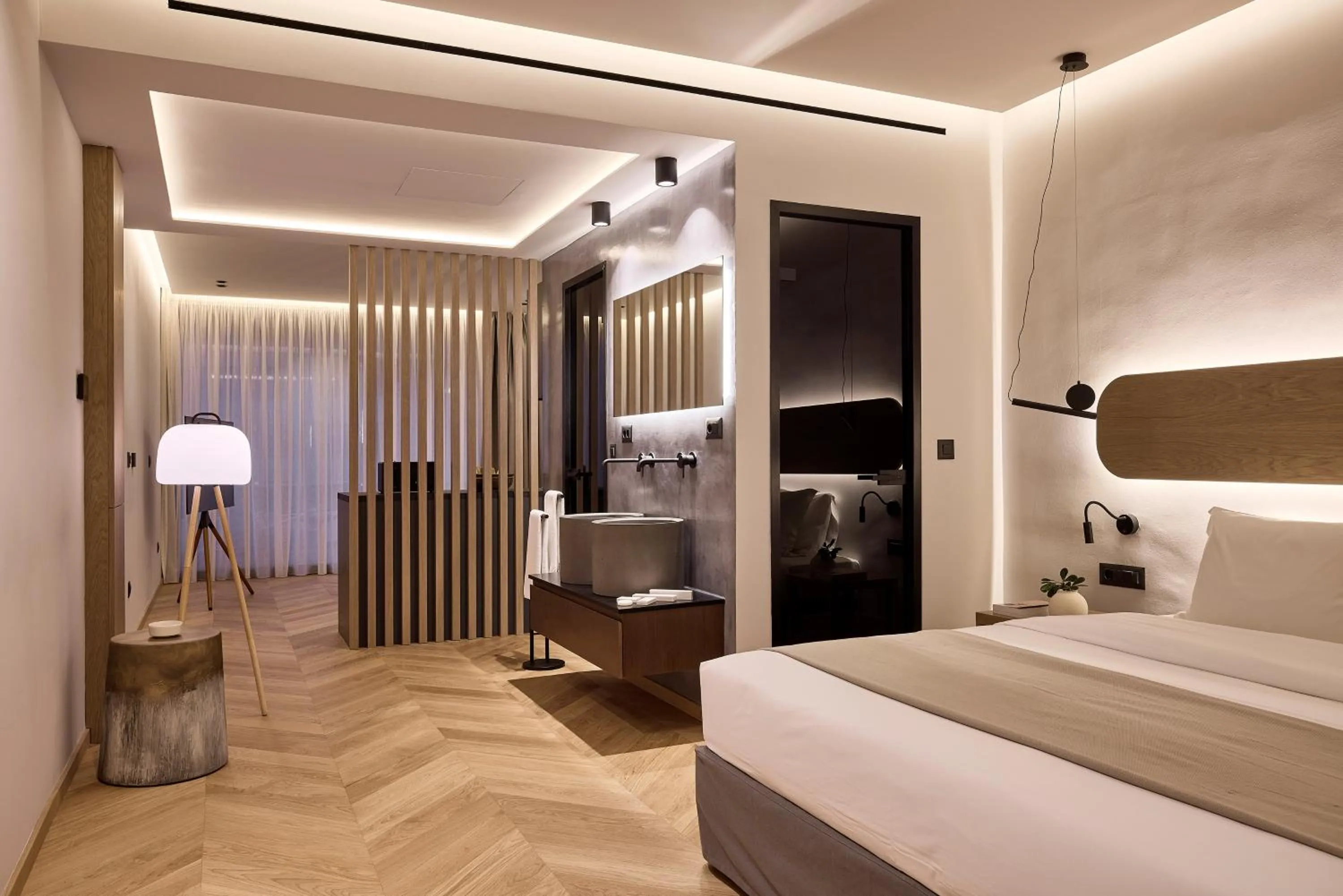 Bed in Cama Luxury Suites Kavouri