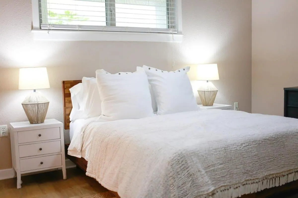 Bed in Sojourn Sanctuary Seaside Escape 3 BR