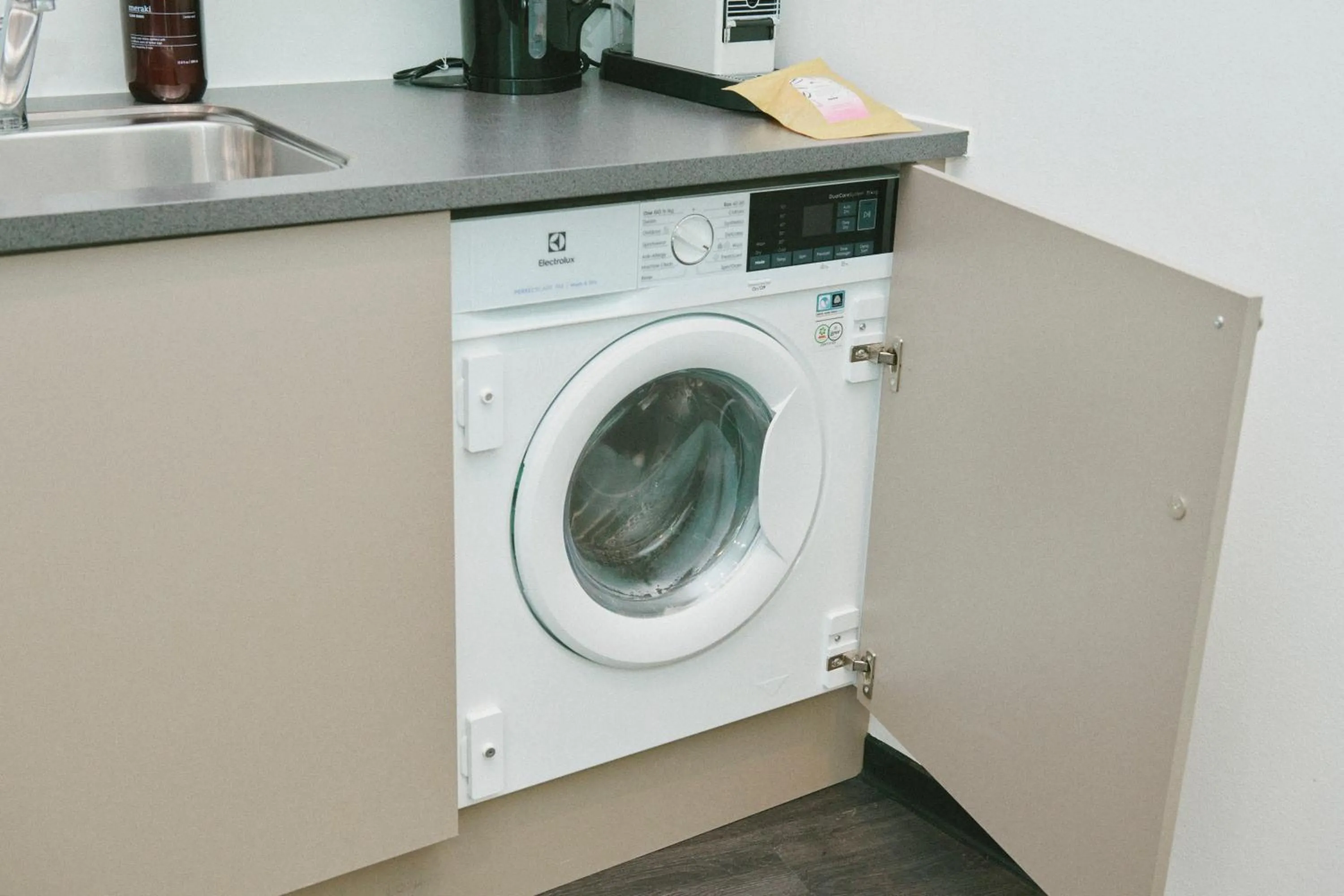 washing machine in The Forest apartments by Daniel&Jacob's